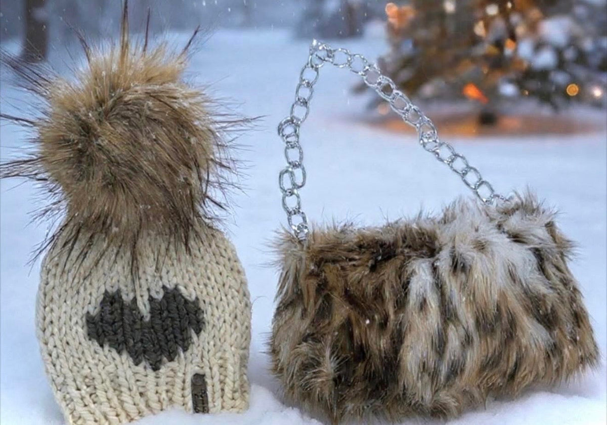 Northwoods Heart Duo handmade ivory and charcoal heart beanie with natural brown faux fur pom