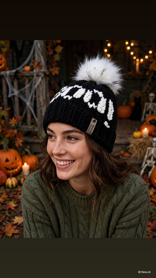 Boo black handmade Halloween beanie with white faux fur pom