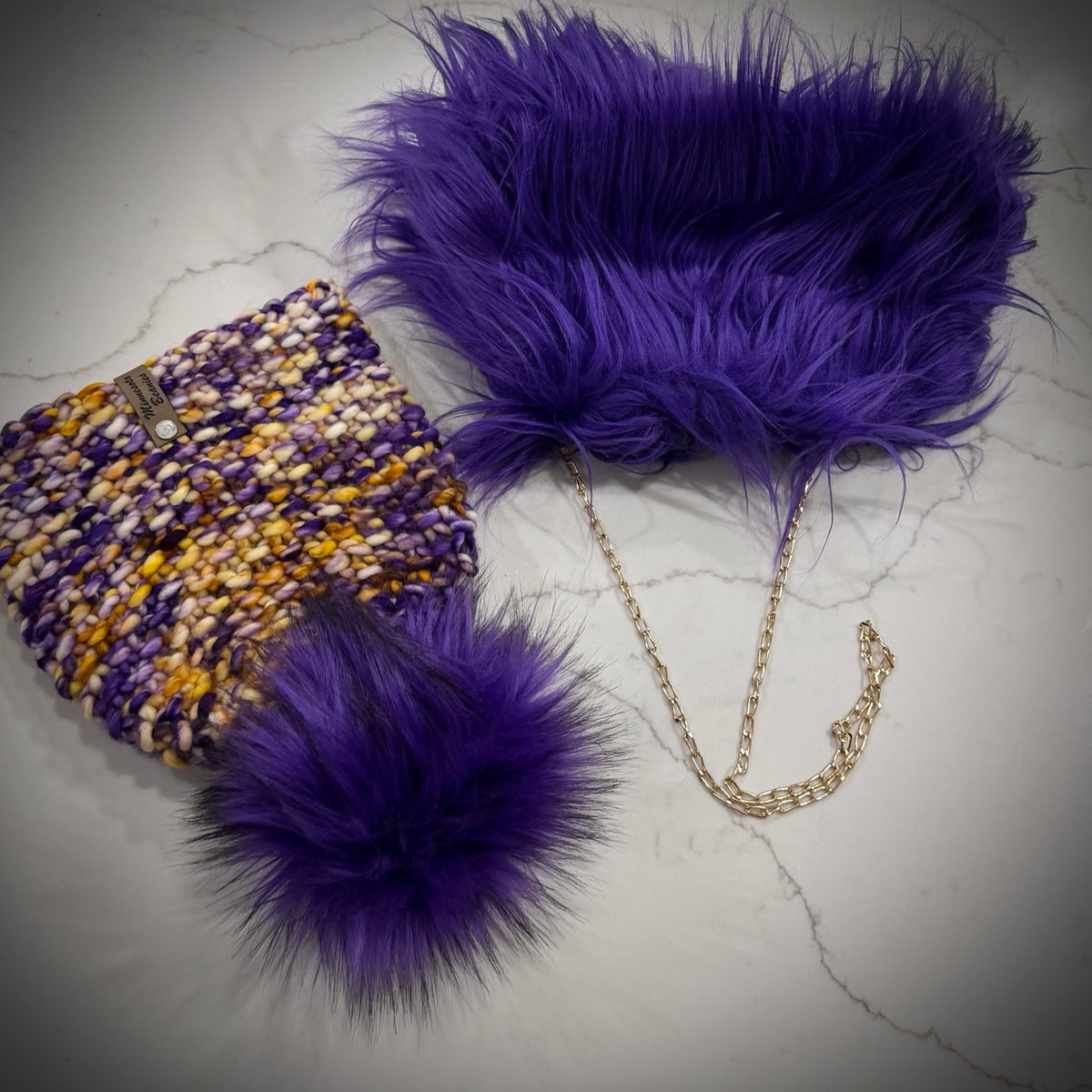 Purple Reign deep purple faux fur handbag with chain strap
