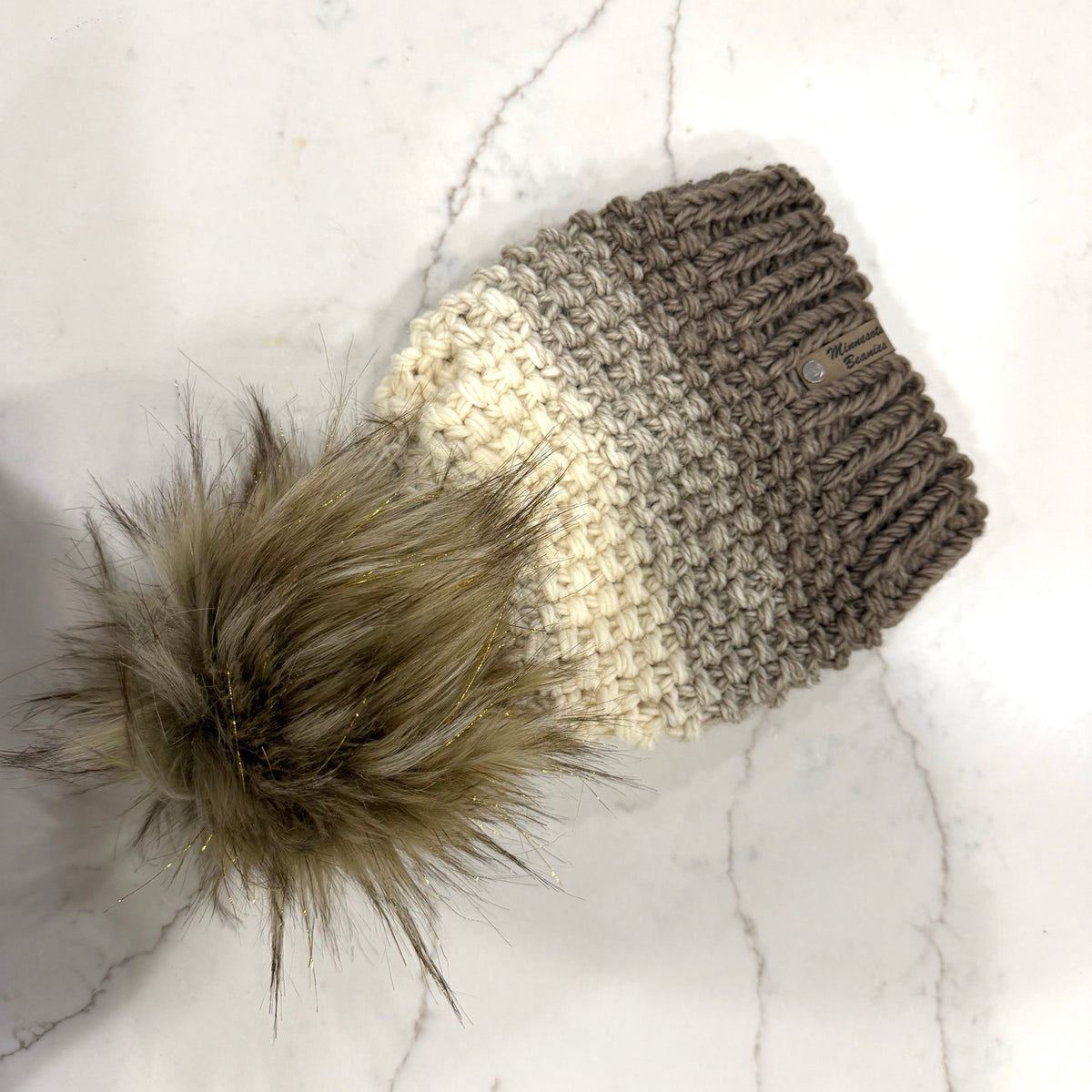 Winter Luxe cream gray and taupe handmade beanie with faux fur pom